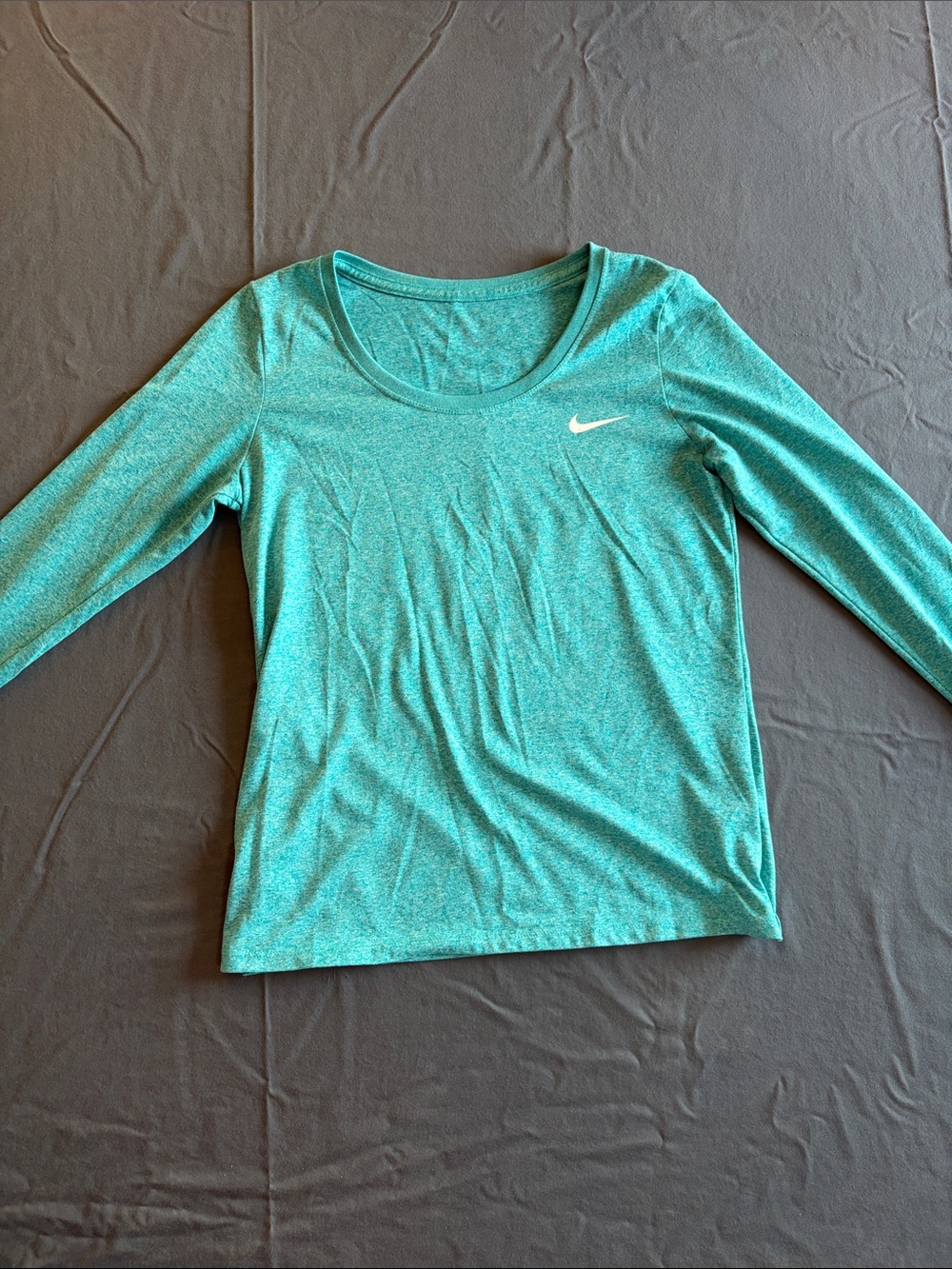 Nike Women's Teal Long-Sleeve Athletic Top with Swoosh